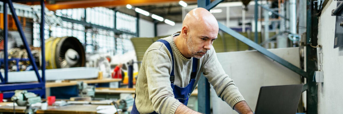 man-using-laptop-in-factory-hero